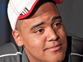 BRIAN THOMPSON, The Expositor

David Knevel wears a University of Nebraska cap on Tuesday during a news conference at Pauline Johnson Collegiate where he announced that he accepted a scholarship to play football with the NCAA school.