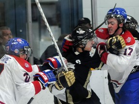 Trenton native and current Kingston Voyageur Brandon O'Quinn (right), seen here tussling with Trenton Golden Hawks' captain Josh Timpano earlier this season, will be among more than 30 Quinte area-born players who will suit up Sunday for a charity game in support of Shedding For Shelter and the Royal LePage Shelter Foundation with all proceeds going to the Three Oaks Foundation's Second Stage Housing program. Game time at Trenton Community Gardens is 6 p.m.