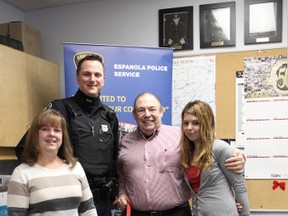 Ron Masciangelo and Vinney finally had an opportunity to meet three of the key people involved in saving their lives after falling through the ice at Black Creek Picnic Area. Medical staff credit Masciangelo’s recovery to Thibeault and the emergency services quick response while involved in his rescue. Espanola Emergency Service dispatcher Lorie Mullen, Espanola Police Services’ Constable Ed Stortz, Ron Masciangelo, Jamie Thibeault and Vinney (golden retriever). 
Photo by Dawn Lalonde/Mid-North Monitor/QMI Agency