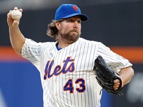 R.A. Dickey tosses his befuddling knuckleball during a Mets game last year. The pitch gets little respect around the major leagues. (Reuters)