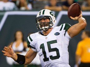 Jets quarterback Tim Tebow passes against the Panthersat MetLife Stadium in East Rutherford, N.J.,, Aug. 26, 2012. (RAY STUBBLEBINE/Reuters)