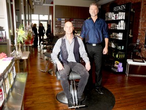 Jazz Hair Studio co-owners Marc Bourgeois and Rick Maybee are seen here in their new salon in downtown Trenton Monday morning during the grand-opening celebration for the new full-service salon.

Emily Mountney Trentonian
