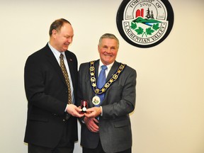 RYAN PAULSEN    Renfrew-Nipissing-Pembroke MPP John Yakabuski, left, presents Laurentian Valley Mayor Jack Wilson with the Queen Elizabeth II Diamond Jubilee Medal, in honour of almost 50 years of municipal service, and countless volunteer activities over the decades.