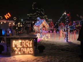 STEPHEN UHLER    KI Pembroke’s property was ablaze in lights Monday, as it kicked off its first ever Holidazzle, which is to be an annual festival of lights. Employees of the office furniture manufacturer spent hundreds of hours of their own time to build creative displays outside the KI building, in an effort to spread some Christmas cheer.