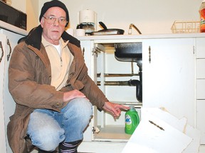 Ron, of the Elliot Lake Men’s Support Centre, shows some of the damage done to the organization’s group home recently. 
Photo by JORDAN ALLARD/THE STANDARD/QMI AGENCY