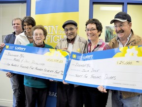 John and Marg Riegling, far left, and Marg's parents Joe and Susan Cabral split one of the grand prizes worth over $100,000 from the Canadian Cancer Society Lottery, while Riegling's cousin Julia Doyle and husband Cy took home a $25,000 early bird prize this year. Chatham-Kent had three lottery winners including Gary Logan who won $10,000. DIANA MARTIN/ THE CHATHAM DAILY NEWS/ QMI AGENCY