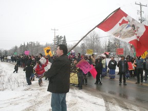 Nearly the entire population of Onigaming marched down Highway 71 southeast of Kenora on Wednesday, Dec. 19, 2012 picking up the nation-wide Idle No More movement.