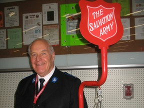 Roy Havens collects donations for the annual Salvation Army Kettle campaign at the Canadian Tire store in Simcoe on Wednesday. (SARAH DOKTOR Simcoe Reformer)
