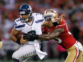 Rookie QB Russell Wilson has his Seahawks on quite a roll this season. Next up for Seattle is a stern test against NaVorro Bowman and his powerhouse 49ers. (Reuters)