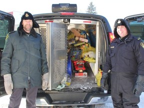 Auxiliary Constables Ralph Johnson and Mike Olkkonen were parked outside of Giant Tiger collecting toys from shoppers for the OPP Stuff-a-Cruiser event on Saturday, Decemeber 15.