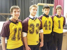 Four of the six Wetaskiwin Composite High School football team, the Sabres, pose for a photo at the league all-star banquet Dec. 6 in Stettler. Joel Bishop was also named the league’s special teams player of the year.