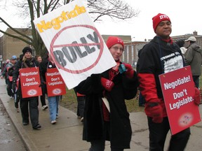 Elementary teachers on the picket line at Central Public School in Woodstock on Thursday, Dec. 20, 2012.