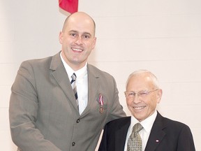 Huron-Bruce MP Ben Lobb presented the Queen's Diamond Jubilee Medal to Kincardine's Loran Peter, 80, during a ceremony in Wingham in November, 2012. Peter was recognize for his contributions to the community. (TROY PATTERSON/KINCARDINE NEWS)