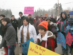 Nearly the entire population of Onigaming marched down Highway 71 southeast of Kenora on Wednesday, Dec. 19, 2012 picking up the nation-wide Idle No More movement. JON THOMPSON/DAILY MINER AND NEWS/QMI AGENCY
