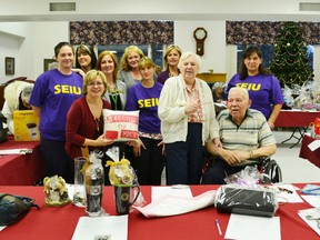 Pictured are employees, managers and residents (in no particular order) Brenda Misch, activity director, Allison Trumbley, Lisa Carr, Andrea Prebtice, resident and family service coordinator, Peggy O’Rourke, Terri Coblentz, Brenda Ohm, administrator, residents Isable and Ralph Strugeon and Pat Norman.