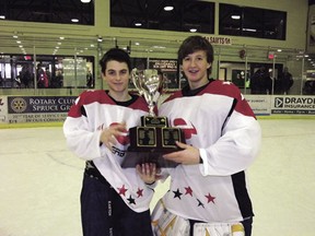 Everett Scherger (at left) and Luke Matwichuk, both of Devon, hold the trophy both won in the Edmonton Rural Bantam Hockey League All Star Game on Sunday, Dec. 16. Both players came up through the Devon Drillers system but currently play with the Leduc Roughnecks.