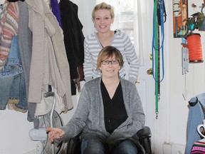 Isabel Guggenheimer, seated, with her friend Aimee Van Vlack. Guggenheimer is wheelchair-bound after suffering a stroke. She's looking for help to pay for a wheelchair lift after being denied social assistance. 
Photo by Hilary Thomson