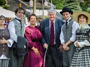 Former prime minister John Napier Turner meets the Sir John A. Macdonald Bicentennial Commission’s acting troupe from SALON Theatre after they performed in the 17th Prime Minister’s honour in City Park in June.