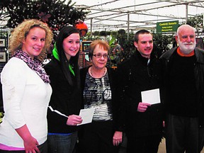 The Druids and the Welsh Society joined forces to present scholarships to a pair of junior players this year. Pictured from left are Amy Rice (Outlaws junior rugby secretary), award winner Amanda Smith, Eluned Smith (president of the St. David’s Welsh Society of Edmonton), award winner Jake Putkalo and Druids/Outlaws founding member Lynn Davies. Photo supplied