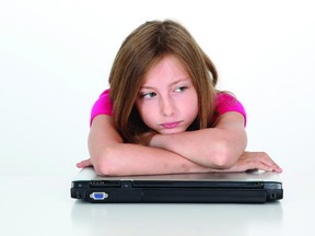Under these proposed changes, the definition of bullying would be expanded to include cyberbullying. (QMI Agency)