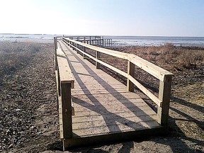 A long, wooden boardwalk along the Mitchell's Bay shoreline is the latest addition to a trail system that begins at the Mitchell's Bay Park and travels southward along the lakeshore, allowing the public a close-up look at the water and migrating waterfowl, including ducks, geese and swans. The trail is being named in memory of the late B.H. (Red) Fisher, a Mitchell's Bay resident who hosted one of the first outdoor television shows in North America and called his home Scuttlebutt Lodge. He filed several segments at the lodge for his show featuring well-known personalities from the world of sports and movies. (Contributed photo)