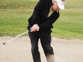 Retired OPP Staff Sgt. Earl Bowes takes a shot at the Cornwall Golf and Country Club in 2011. Bowes is on the mend and in great spirits after major surgery at The Heart Institute.
File photo/ERIkA GLASBERG