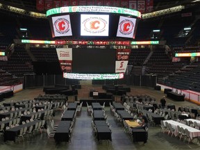 Scotiabank Saddledome staff set up for the Calgary Flames Celebrity Charity Golf Classic which will feature no current players in Calgary, Alberta. (DARREN MAKOWICHUK/QMI AGENCY)