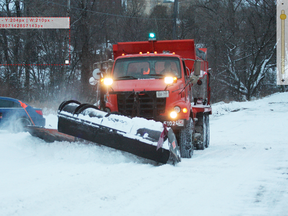 A snowplow clears a Sudbury street. (John Lappa, Sudbury Star file photo)