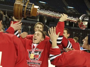 Edmonton’s South Side Athletic Central Club players celebrate winning the first Mac’s Tournament championship by an Edmonton team on Jan 1. 2011. FILE PHOTO QMI Agency