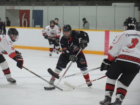 Kurtis Pettitt of the Norfolk Rebels heads to the net in his team’s 16-1 loss at home to the Ayr Centennials on Sunday afternoon. (DANIEL R. PEARCE Simcoe Reformer)
