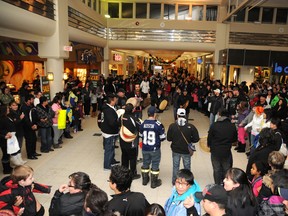 Graeme Bruce/Daily Herald-Tribune
Hundreds of supporters of the Idle No More First Nation grassroots movement link hands the length of the Prairie Mall while others beat their drums in the centre at Prairie Mall on Friday.