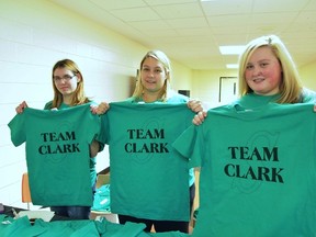 Staff and students at LP Miller sell Tshirts to raise funds f...