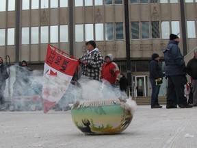 About 200 or more people gathered at Sarnia City Hall for a protest as part of the Idle No More movement Monday. The group marched to Highway 402 through the city in support of the national First Nations protests. PAUL MORDEN/THE OBSERVER/QMI AGENCY