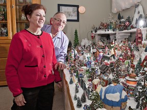 June Wilson and Hugh Foy look over the Christmas village consisting of more than a hundred buildings, and even more figures which they have constructed in their Brantford, Ontario home.  The couple have been collecting Christmas-themed items for about 25 years, and it's become a year-round hobby.BRIAN THOMPSON/BRANTFORD EXPOSITOR/QMI Agency