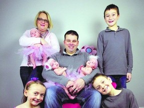 The Wentzell family of Aylmer celebrated a pink Christmas this year with the addition of triplets born in September. Pictured kneeling, Paige Wentzell, left, and Bryce Webber. Back row, Mary Anne Wentzell with Ainsley, Travis Wentzell with Caylee and Brooklyn, and Tyson Wentzell. (Contributed photo)