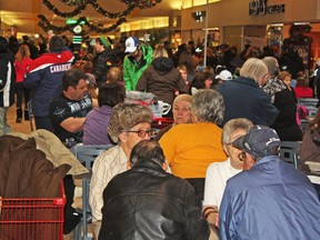 While the Boxing Day crowds and lineups may not appeal to everyone, happy holiday-season vibes still permeated throughout the Timmins Square on Wednesday during 2012's last big shopping extravaganza.