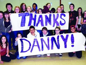 Youth from KCHC’s Pathways to Education react upon learning that former Newfoundland Premier Danny Williams has generously arranged for them to see Sir John, Eh? The Musical, on Jan. 12 at Kingston’s Grand Theatre.     Contributed photo