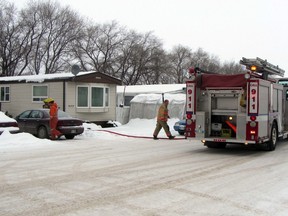 Emergency crews responded to a fire on Mobile St., Thursday, at approximately 10:30 a.m. It does not appear there are any injuries as a result of the fire. (ROBIN DUDGEON/PORTAGE DAILY GRAPHIC/QMI AGENCY)