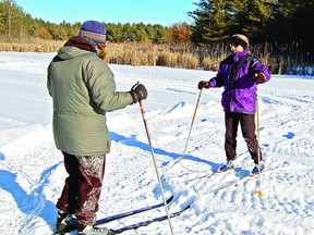 Ski Instructor Marta Scythes gives guidance to a student at Little Cat conservation area. Scythes will be providing cross-country ski lessons each Saturday between Jan. 5 and Feb.3, weather permitting.     Contributed photo