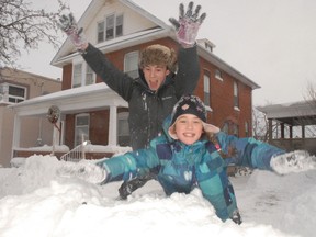Brandon Shurr, 17, and his stepsister Kayla Elbert, 11, indulged in this week’s super snowfall Thursday afternoon. About 30cm fell on the area on Boxing Day night. (DANIEL R. PEARCE Simcoe Reformer)