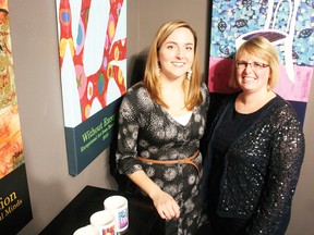 The Cornwall Regional Art Gallery is hosting a fundraising exhibit, Without Exception: Exceptional Art From Beautiful Minds, which has already opened and runs until Jan. 25. The pieces of art were created by young students with special needs. From left, co-coordinators Lindsay Melnick and Mieke Stacey. 
Staff photo/GREG PEERENBOOM