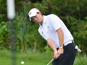 Riley Fleming chips onto the green during the Canadian Amateur Championship practice round which is being held at Camelot Golf & Country Club in Cumberland, Ontario on Aug. 6.
MATTHEW  USHERWOOD/QMI AGENCY