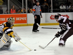Kingston Frontenacs goalie Mike Morrison denies a chance by Francis Menard of the Peterborough Petes during Ontario Hockey League action Friday night at the K-Rock Centre. (Jeff Peters/For The Whig-Standard)
