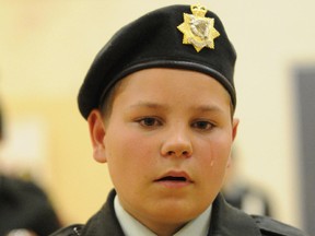 In this file photo, Cpl. Brandon Manion tears up as he gets the Award of Bravery at the 2915 Irish Regiment of Canada Capreol Royal Canadian Army Cadet Corps 39th annual inspection. He was awarded for trying to save his friend, Dakota Gervais, who got swept downstream in the Vermillion River.