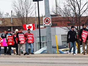 Job action by teachers, such as this in the final week of school for 2012 in front of Annandale, may increase in the new year. File Photos by Kristine Jean/Tillsonburg News