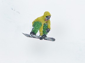 A little snow doesn't stop snowboarder Joel Coultier from doing some tricks at Big Ben Ski Centre on Saturday afternoon.
Staff photo/ERIKA GLASBERG