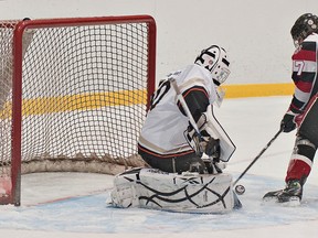 BRIAN THOMPSON, The Expositor

Andrew Mitton of the Brantford 99ers tries to put the puck past London goalie Zach McCosh on Sunday during the minor bantam A championship at the 43rd annual Wayne Gretzky International Hockey Tournament.