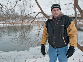 BRIAN THOMPSON, The Expositor

Jim Lyons of Harold Avenue stands by the spot along Gilkison Street where he jumped into the icy waters of the Grand River on Friday to rescue a dog.