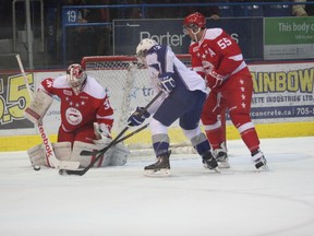 Greyhounds goalie Matt Murray makes a save as defenceman Ryan Sproul keeps tabs on a Sudbury player.