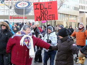 Idle No More protesters block Portage and Main in Winnipeg, Man. Monday Dec. 31, 2012 in opposition to Bill C45.
BRIAN DONOGH/WINNIPEG SUN/QMI AGENCY